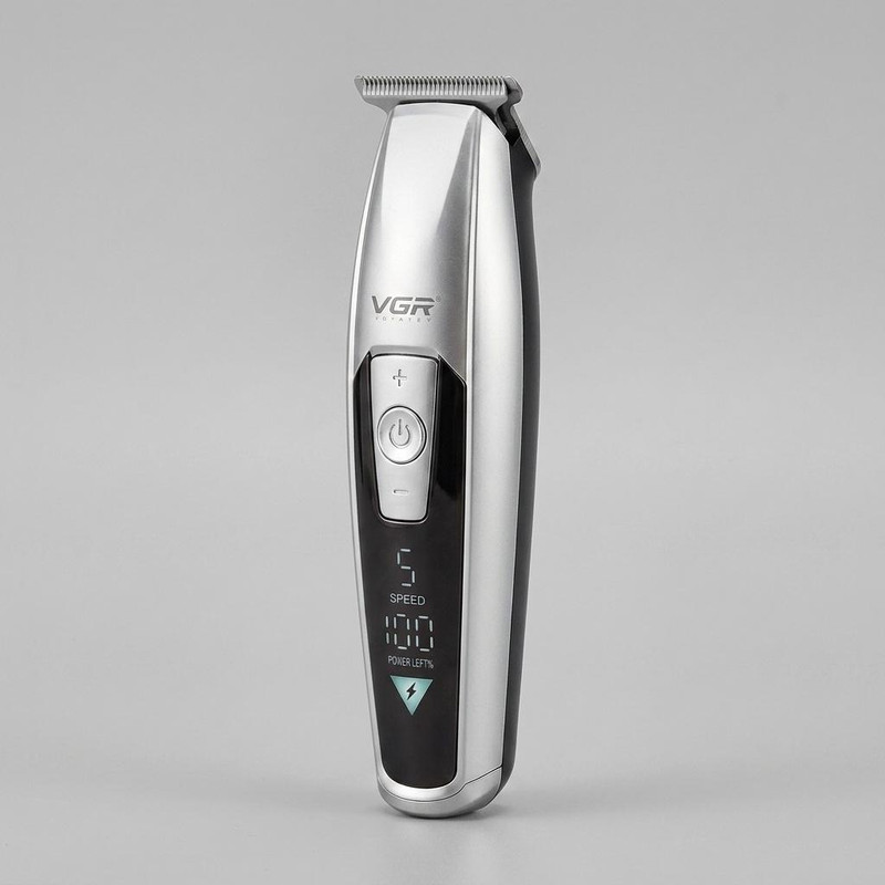 ماشین اصلاح موی سر و صورت وی جی ار مدل V-970 با تیغه استیل ضد زنگ، باتری قابل شارژ با 240 دقیقه استفاده، 5 سرعت قابل تنظیم، طراحی ارگونومیک و 3 شانه تنظیم طول 2، 3 و 4 میلی‌متر